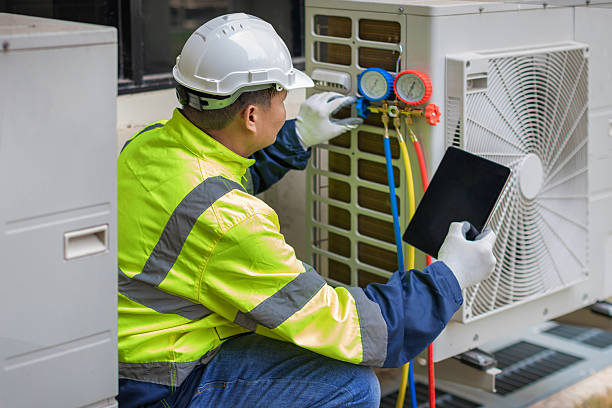 Professional Heat Pump Repair technician working in Somers, WI